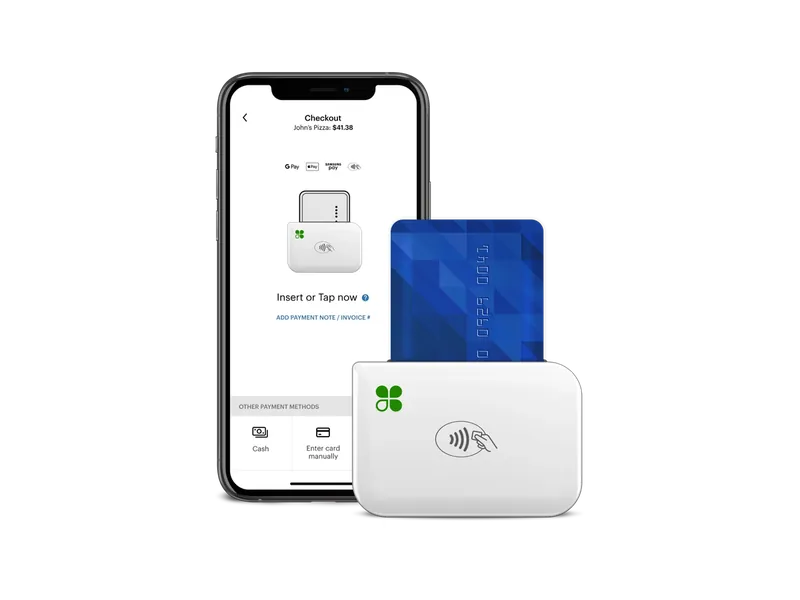 Clover Go card reader paired with a phone for taking payments on the move